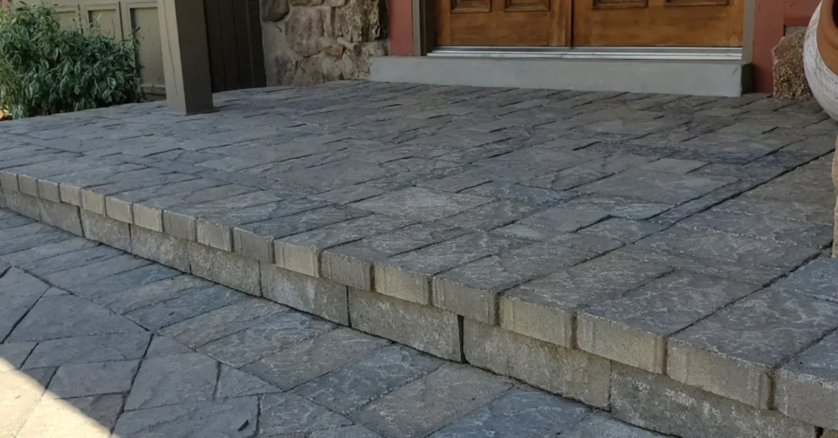 paver walkway over a concrete walkway